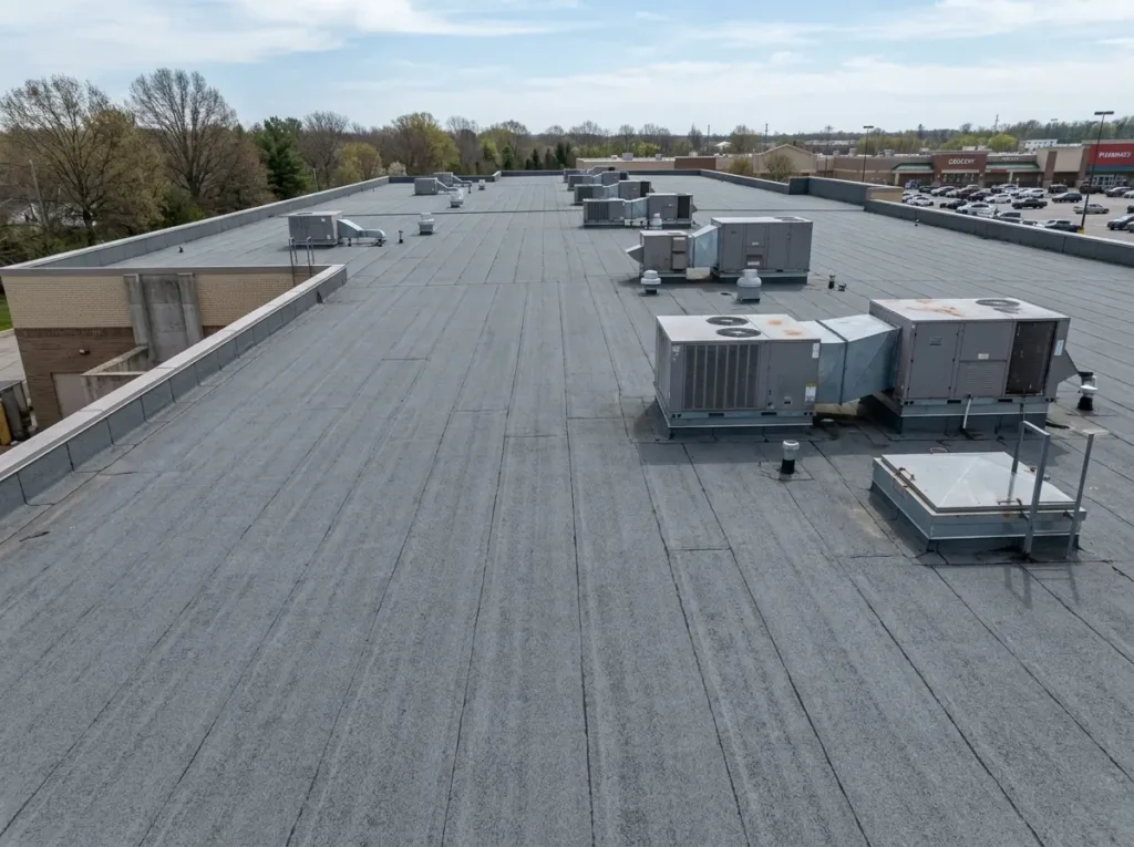Granulated mod bit roof on a retail center with rooftop HVAC units